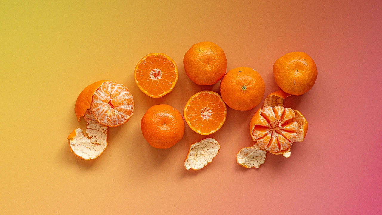 Various fresh oranges on gradient background