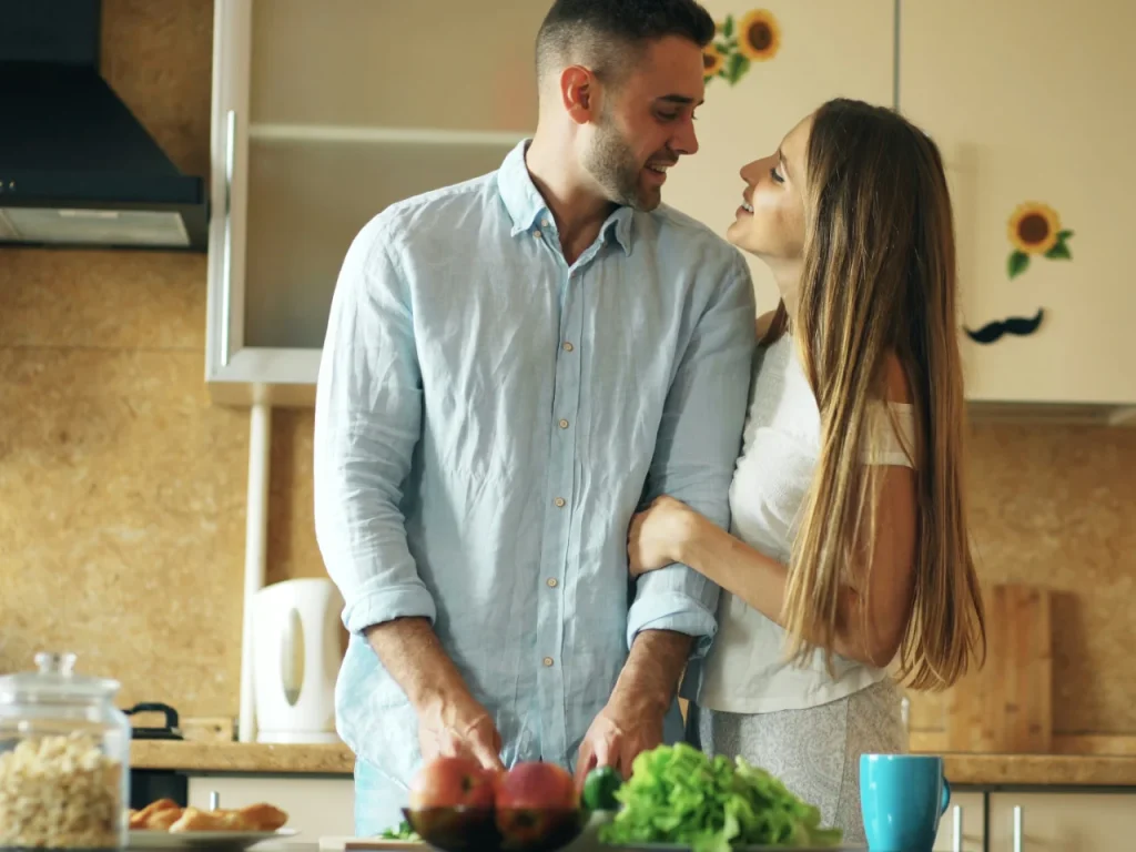 Couple cooking together, building friendship as part of the Sound Relationship House
